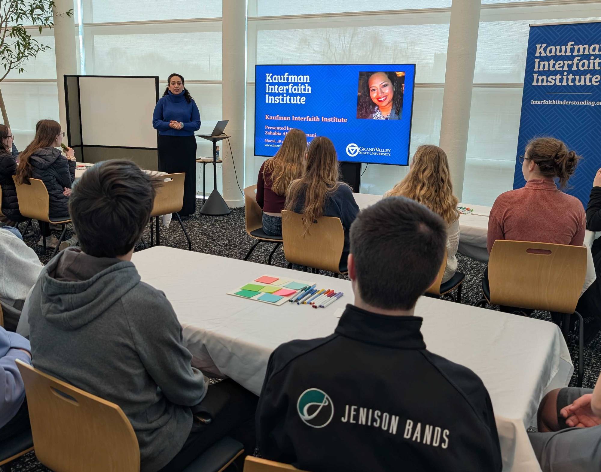 Zahabia talking to students from Jenison